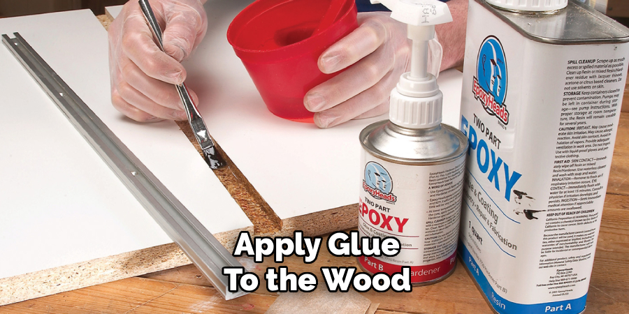  Apply Glue 
To the Wood