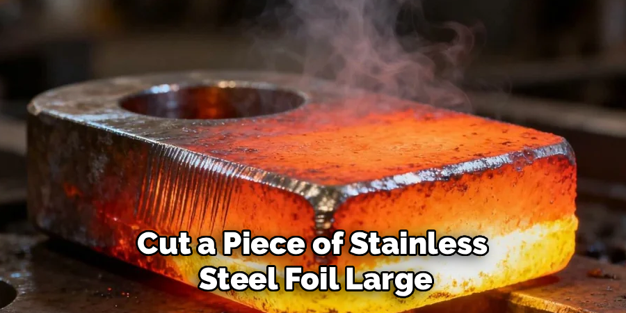 Cut a Piece of Stainless
Steel Foil Large