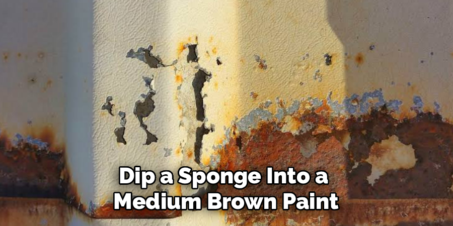Dip a Sponge Into a
Medium Brown Paint