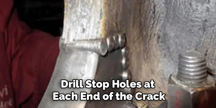 Drill Stop Holes at
 Each End of the Crack