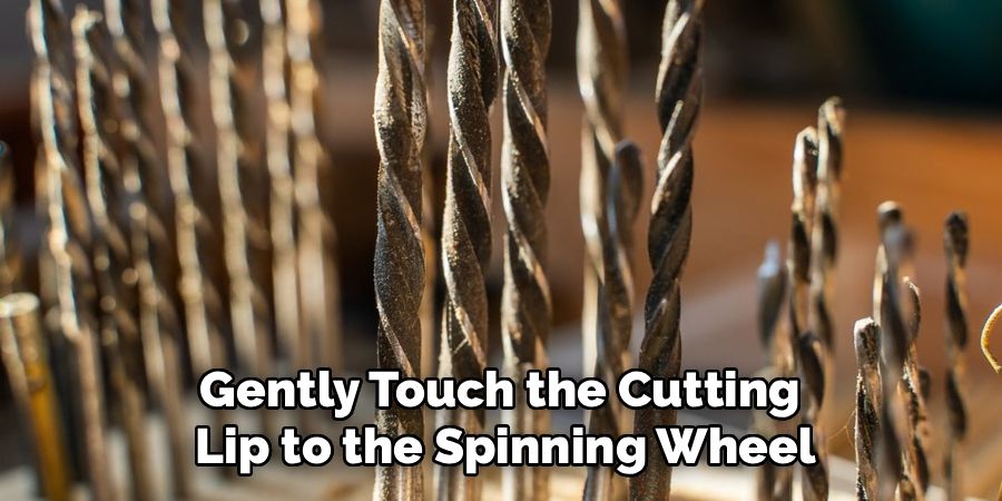 Gently Touch the Cutting 
Lip to the Spinning Wheel