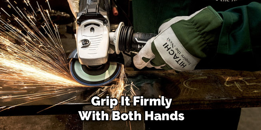  Grip It Firmly
 With Both Hands