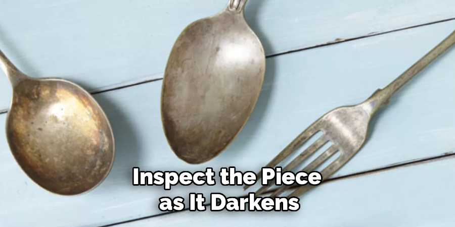 Inspect the Piece
as It Darkens