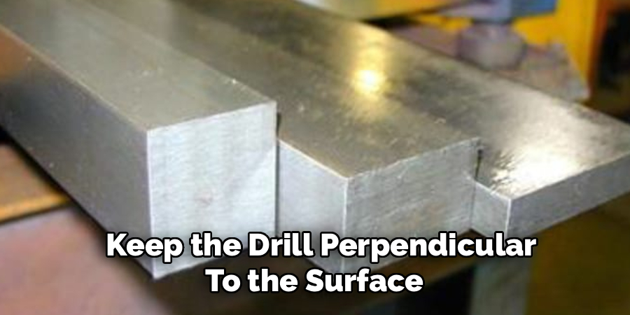 Keep the Drill Perpendicular
To the Surface
