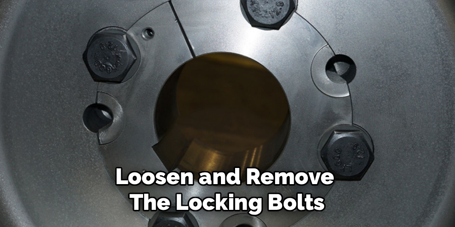 Loosen and Remove 
The Locking Bolts