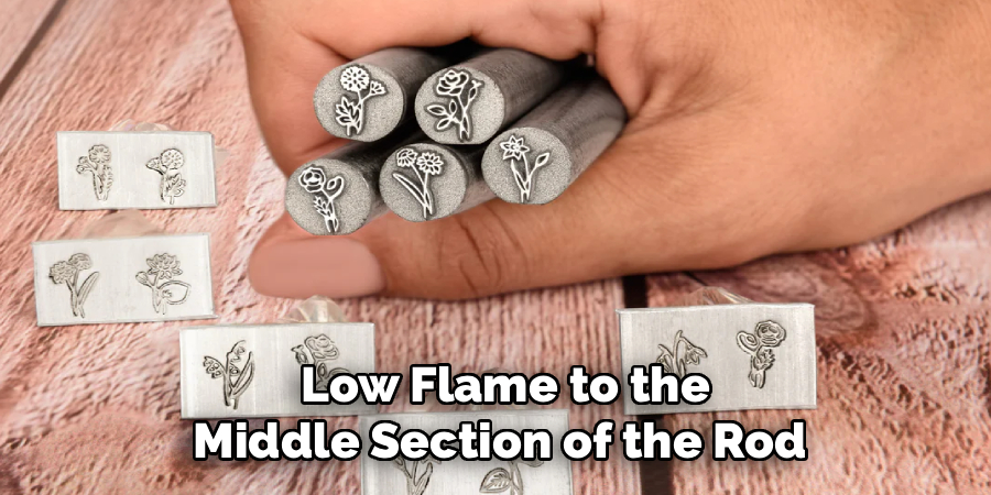 Low Flame to the
Middle Section of the Rod