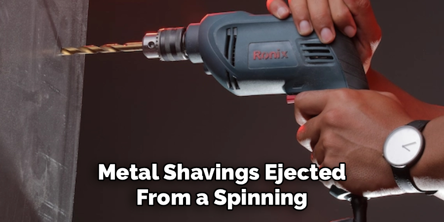 Metal Shavings Ejected
 From a Spinning 