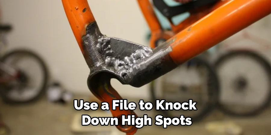 Use a File to Knock
Down High Spots