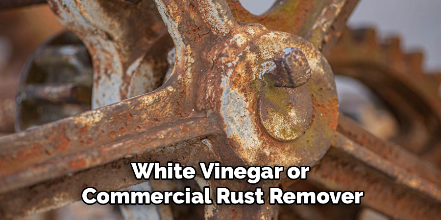 White Vinegar or Commercial Rust Remover