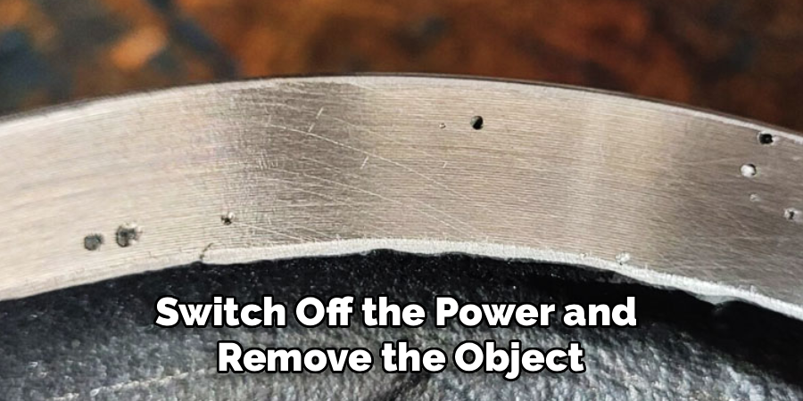 Switch Off the Power and
Remove the Object