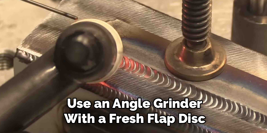 Use an Angle Grinder
With a Fresh Flap Disc