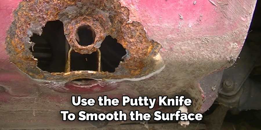 Use the Putty Knife
To Smooth the Surface