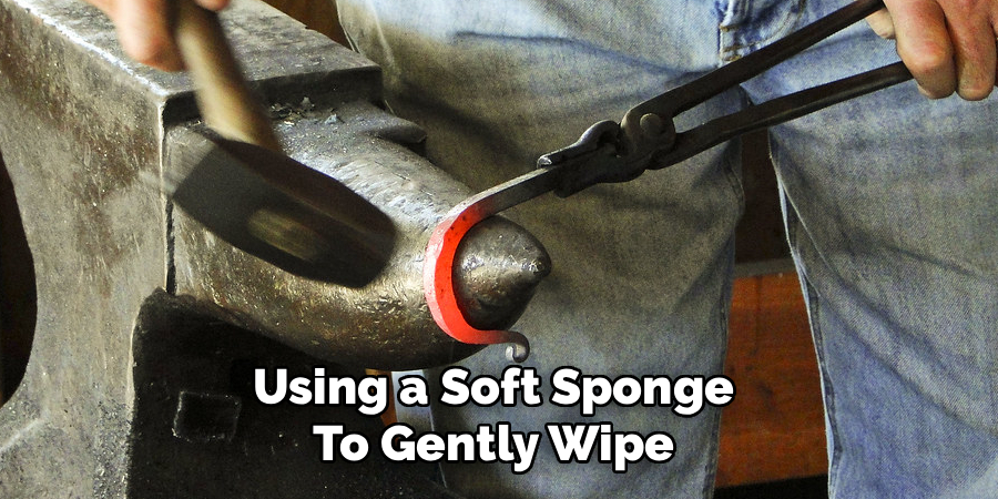 Using a Soft Sponge 
To Gently Wipe 
